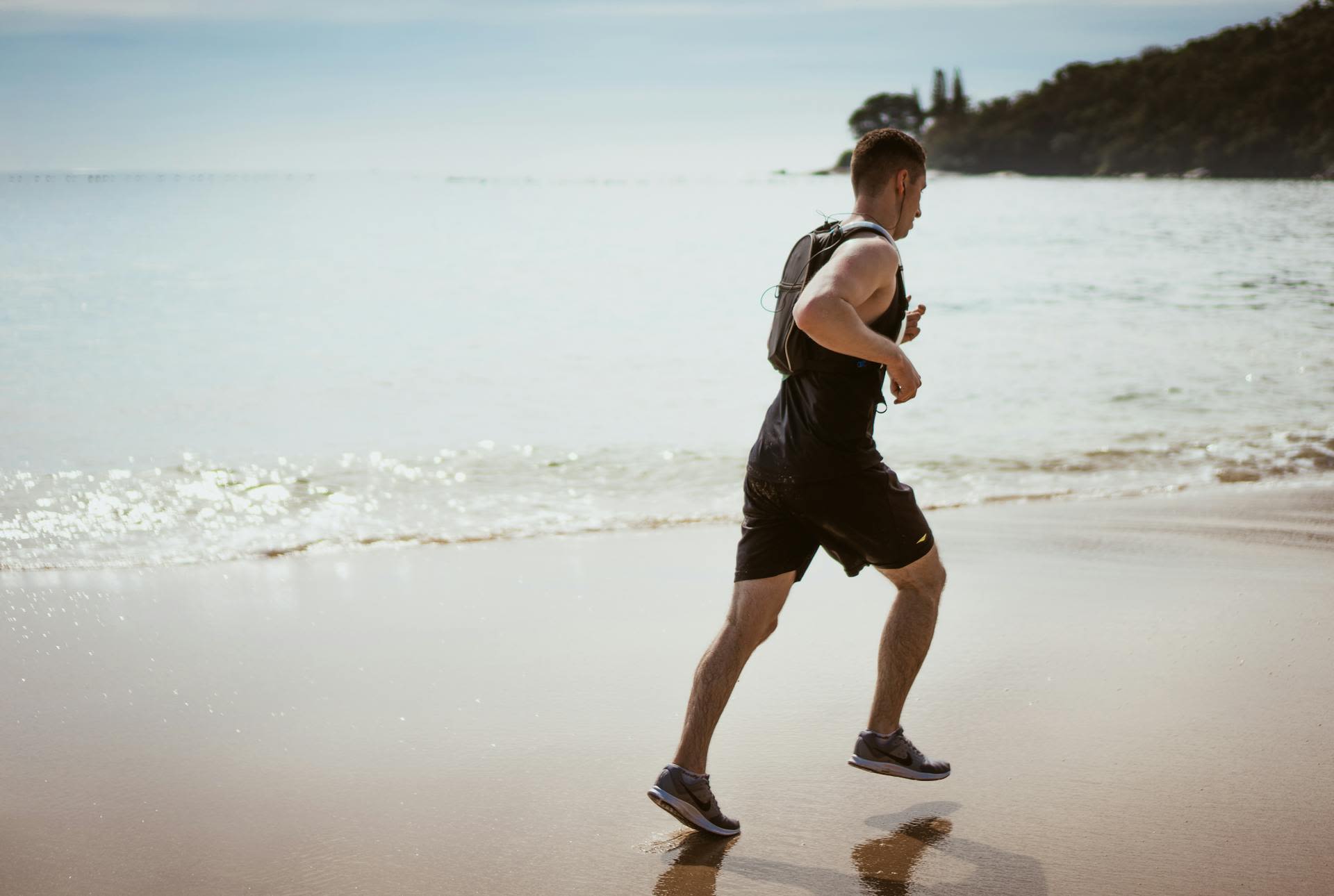 man running on the beach